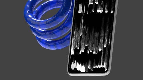 Closeup of a mobile device on a dark grey background with a decorative blue spring behind it